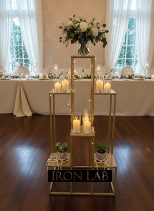 alzate_multipla_per_confettata_oro__sfondi_struttura_per_passaggio__oro__in_ferro_per_feste_eveti__wedding_planner_allestimenti